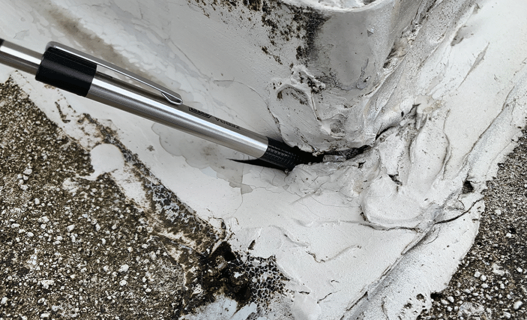 Exterior Wall Coating Being Applied for UV Protection